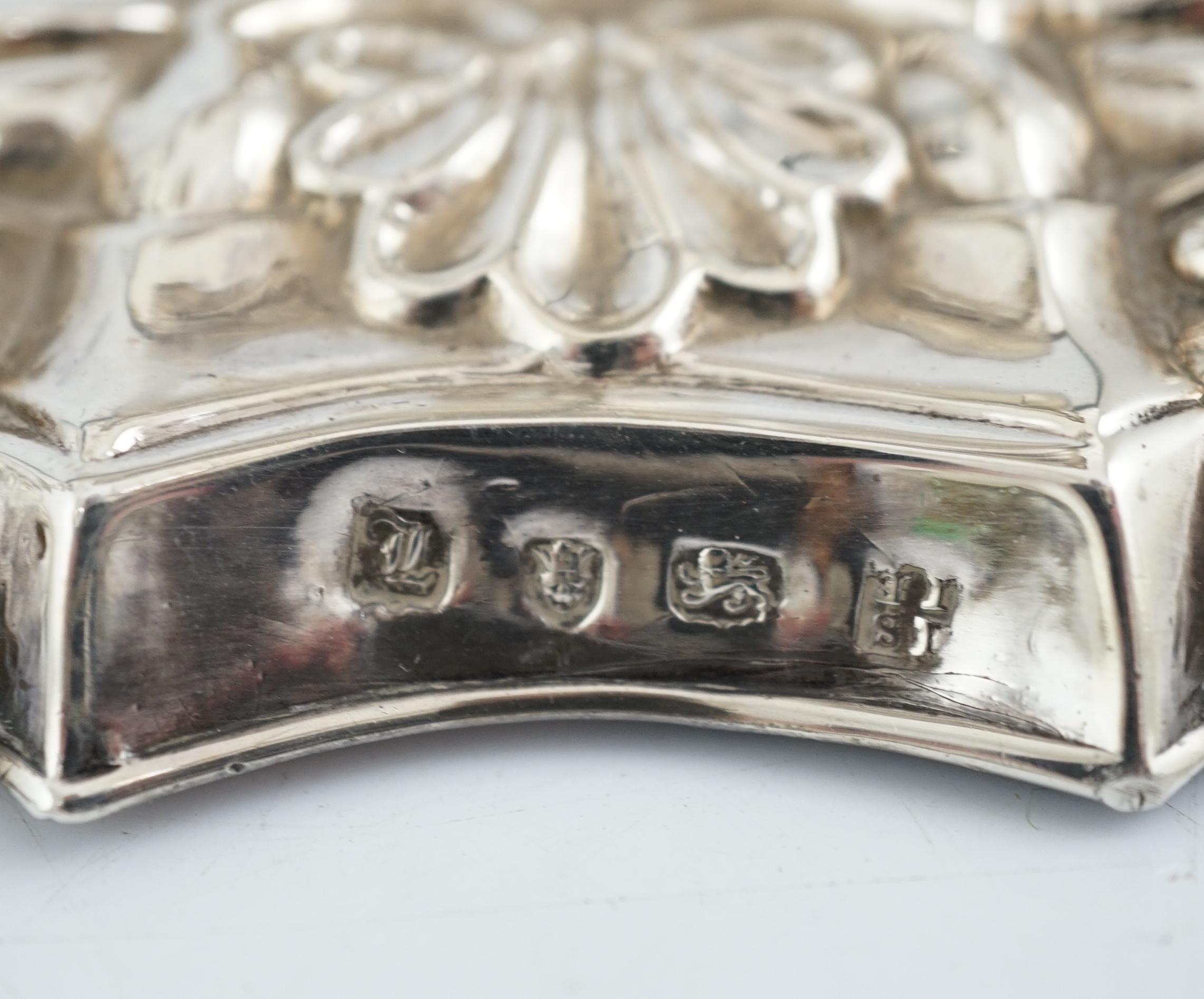 A pair of early George III silver candlesticks, by James Stamp & John Baker